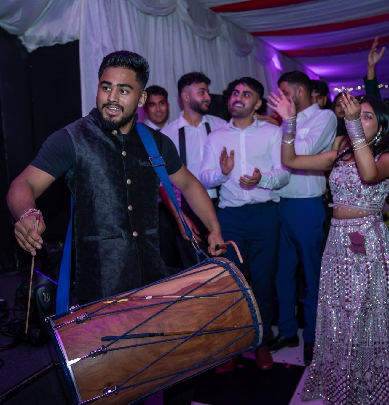 Dynasty Drummers opening a high-energy dhol performance